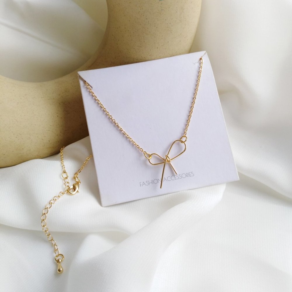 Minimalist Bow Necklace - Picture 5 of 7